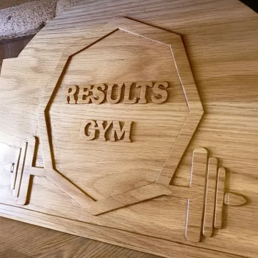 Oak gym sign reading 'Results Gym'