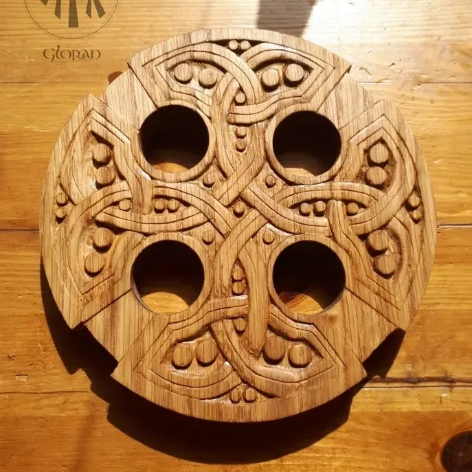 Arwyn of Cân Cŷn y Gloran carving the cross of St. Lawrence's church