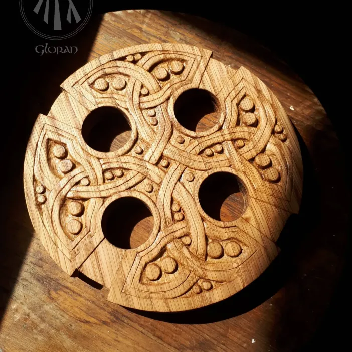 An oak carved restoration of a stone cross fround in Laleston by Cân Cŷn y Gloran