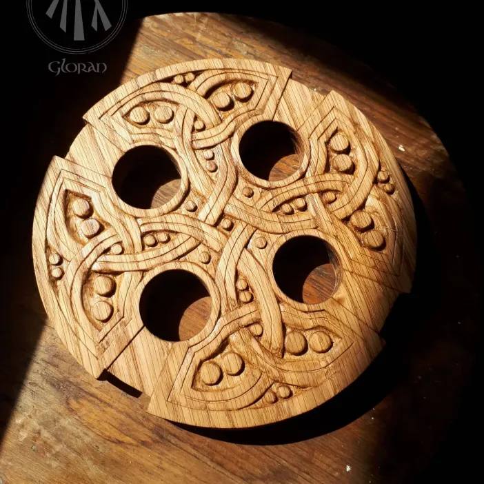 An oak carved Celtic cross of Saint Lawrence's church, replicated by Cân Cŷn y Gloran
