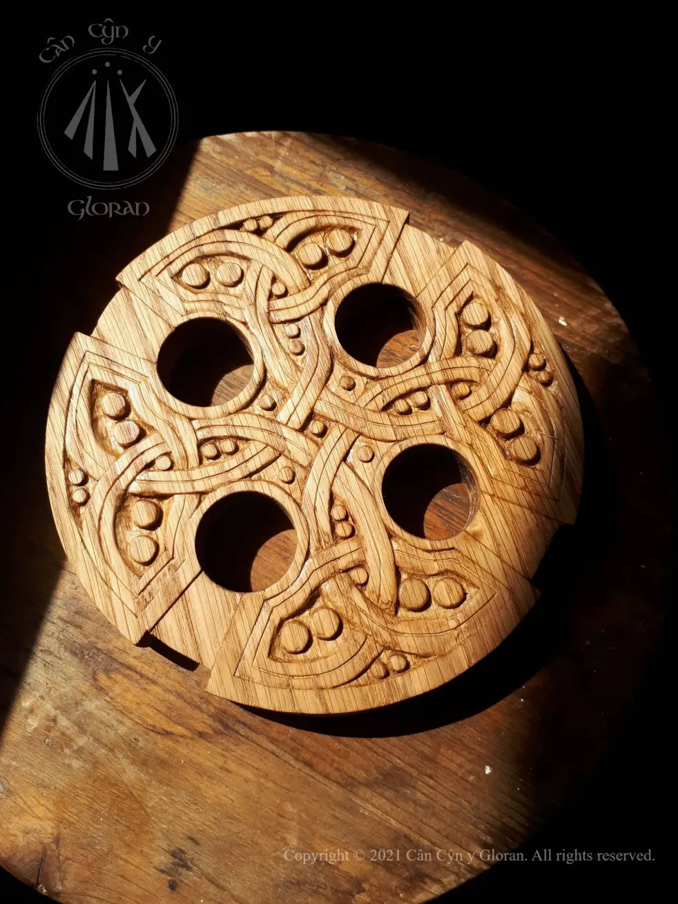 An oak carved Celtic cross of Saint Lawrence's church, replicated by Cân Cŷn y Gloran